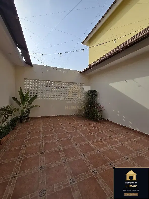 500 Sq. Yd. 5-Bedroom Luxury Villa (Basement, 6 Bath, Residence 3) on Zulfiqar Commercial For Sale in DHA Phase 8 Karachi — Photograph 9