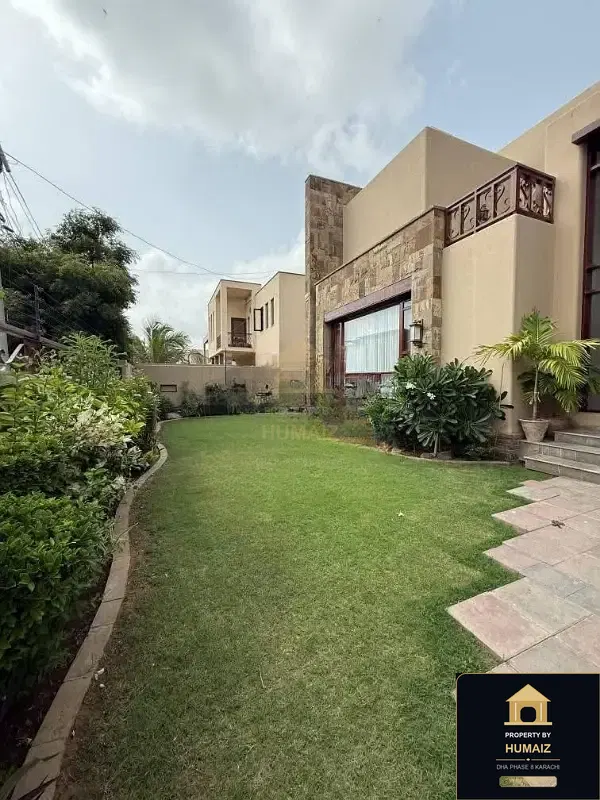 1,000 Sq. Yd. 6-Bedroom Luxury Villa (6 Bath, Residence 10) in DHA Phase 8 For Rent in DHA Phase 8 Karachi — Photograph 5