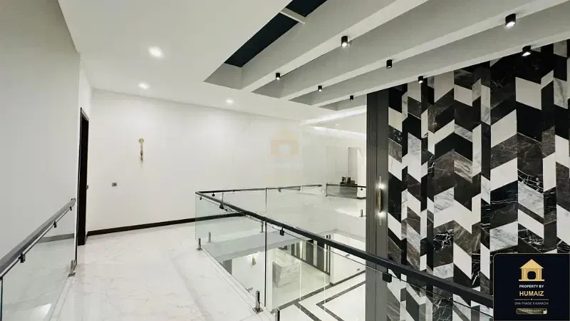 1,000 Sq. Yd. 6-Bedroom Luxury Villa (Basement, 7 Bath, Residence 5) in Zone A For Sale in DHA Phase 8 Karachi — Photograph 7