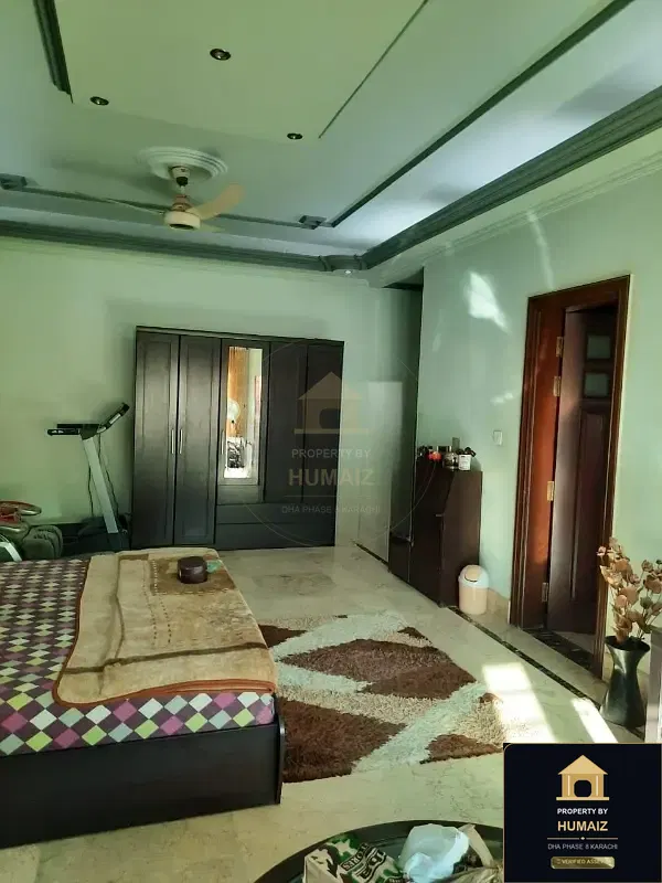 1,000 Sq. Yd. 6-Bedroom Luxury Villa (6 Bath, Residence 30) in DHA Phase 8 For Sale in DHA Phase 8 Karachi — Photograph 4