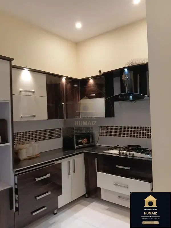 100 Sq. Yd. 3-Bedroom Luxury Villa (Basement, 3 Bath, Residence 1) in DHA Phase 8 For Sale in DHA Phase 8 Karachi — Photograph 3