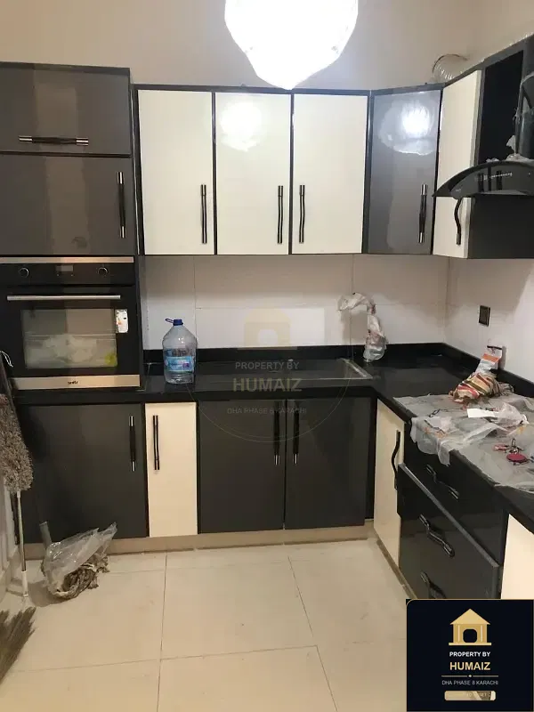 120 Sq. Yd. 4-Bedroom Luxury Villa (Basement, 4 Bath, Residence 1) in DHA Phase 8 For Rent in DHA Phase 8 Karachi — Photograph 3