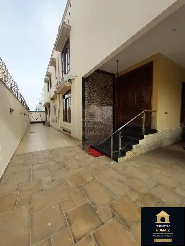 1,000 Sq. Yd. 6-Bedroom Luxury Villa (West Open, 6 Bath, Residence 8) in DHA Phase 8 For Rent in DHA Phase 8 Karachi — Photograph 3
