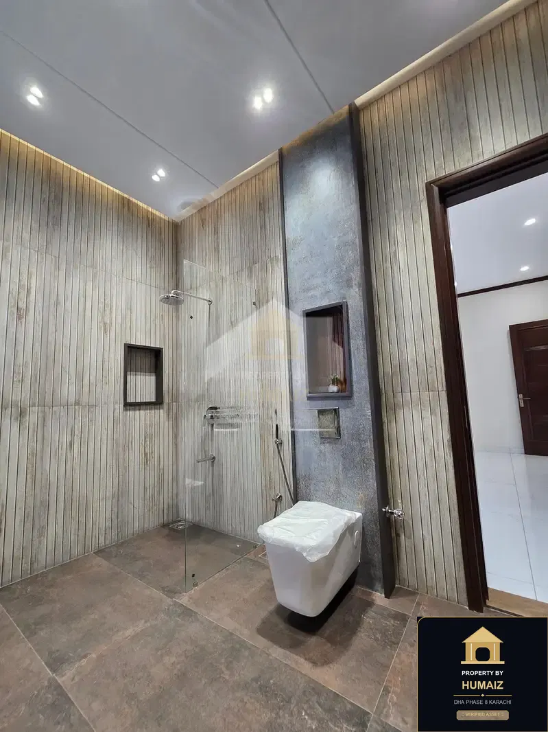 500 Sq. Yd. 5-Bedroom Luxury Villa (Private Pool, 6 Bath, Residence 2) in DHA Phase 8 For Sale in DHA Phase 8 Karachi — Photograph 4