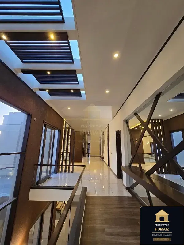 1,000 Sq. Yd. 7-Bedroom Luxury Villa (Basement, 7 Bath, Residence 2) in Khayaban-e-Ittehad For Sale in DHA Phase 8 Karachi — Photograph 7
