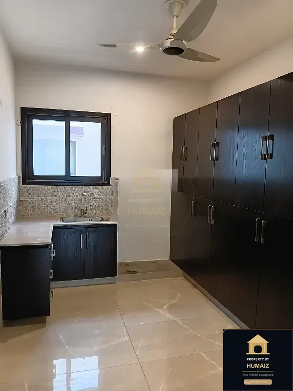 500 Sq. Yd. 6-Bedroom Luxury Villa (Basement, 5 Bath, Residence 31) in DHA Phase 8 For Rent in DHA Phase 8 Karachi — Photograph 9
