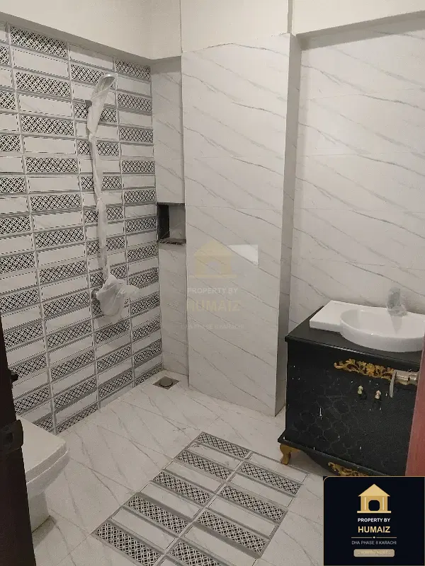 4-Bedroom Luxury Apartment (Basement, 5 Bath, Suite 1) in DHA Phase 8 For Sale in DHA Phase 8 Karachi — Photograph 9