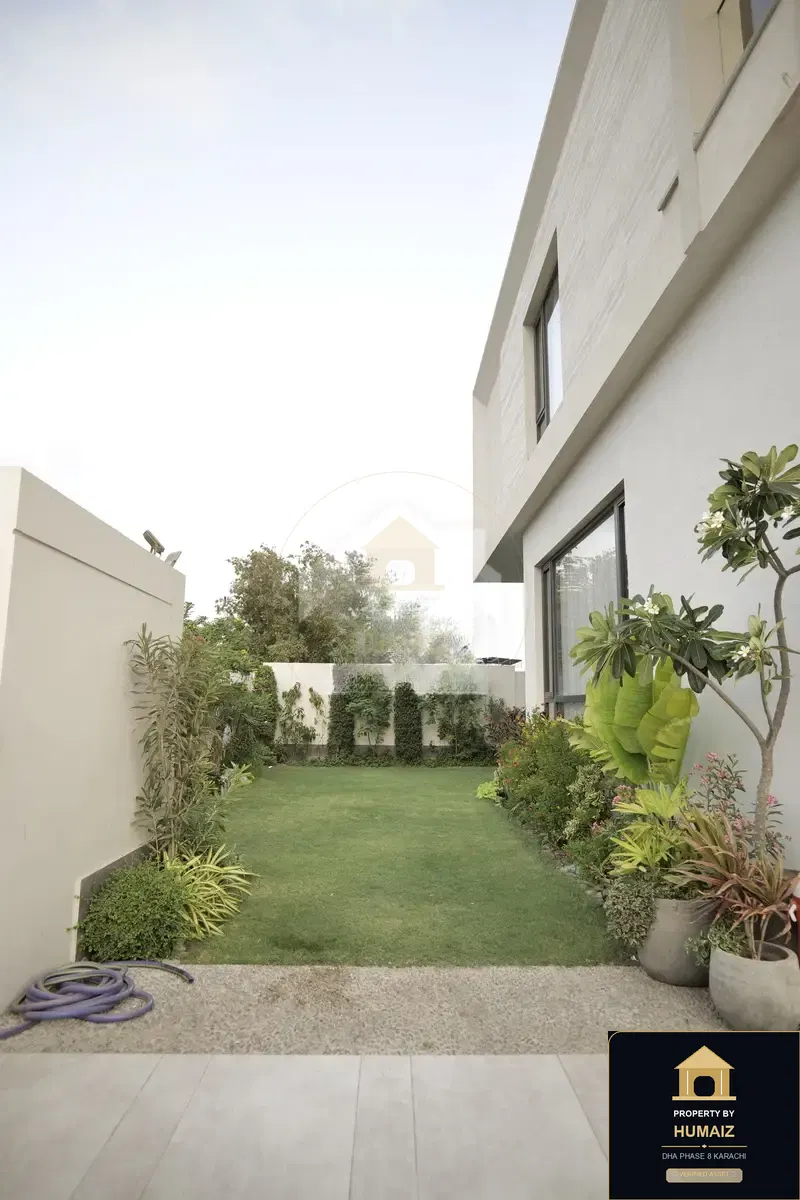 1,000 Sq. Yd. 7-Bedroom Luxury Villa in Khayaban-e-Bahria For Sale in DHA Phase 8 Karachi — Photograph 5