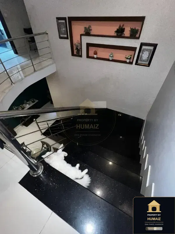 500 Sq. Yd. 6-Bedroom Luxury Villa on Khayaban-e-Tariq For Sale in DHA Phase 8 Karachi — Photograph 9