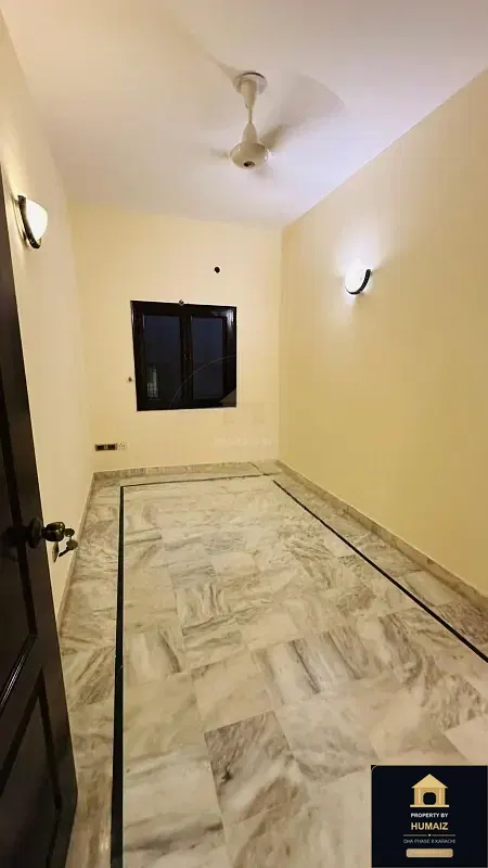 4-Bedroom Upper/Lower Portion (5 Bath, Unit 2) in DHA Phase 8 For Rent in DHA Phase 8 Karachi — Photograph 9