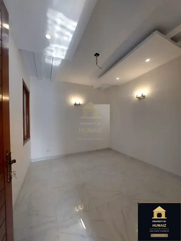 100 Sq. Yd. 4-Bedroom Luxury Villa (Basement, 5 Bath, Residence 3) in DHA Phase 8 For Sale in DHA Phase 8 Karachi — Photograph 3
