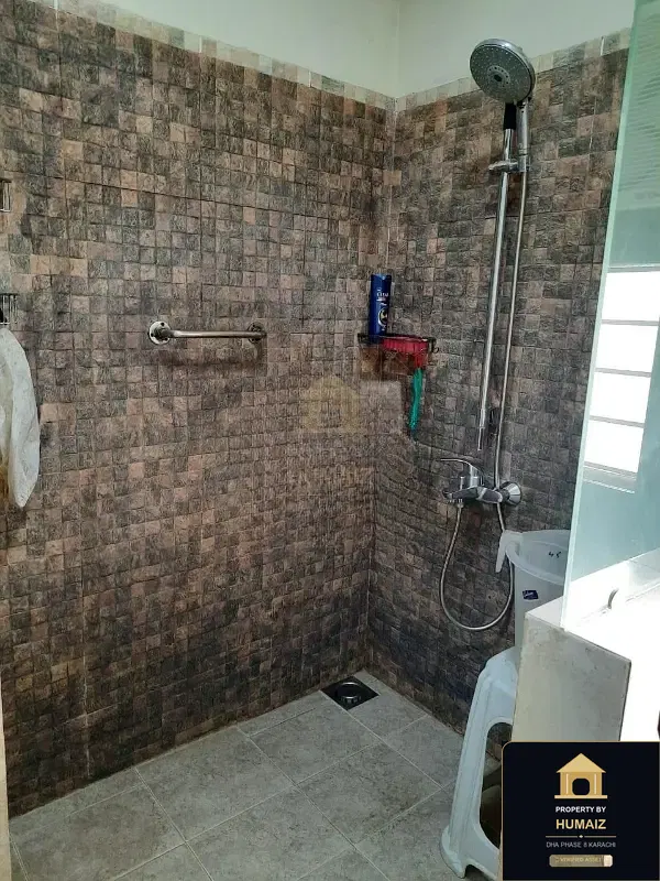 1,000 Sq. Yd. 6-Bedroom Luxury Villa (6 Bath, Residence 31) in DHA Phase 8 For Sale in DHA Phase 8 Karachi — Photograph 12