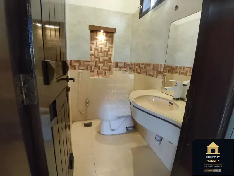 500 Sq. Yd. 6-Bedroom Luxury Villa (Basement, 7 Bath, Residence 12) in DHA Phase 8 For Rent in DHA Phase 8 Karachi — Photograph 10