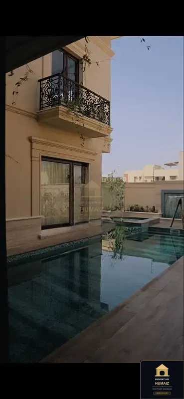 1,000 Sq. Yd. 6-Bedroom Luxury Villa (Private Pool, 6 Bath, Residence 9) in Zone A For Sale in DHA Phase 8 Karachi — Property by Humaiz Architectural Asset