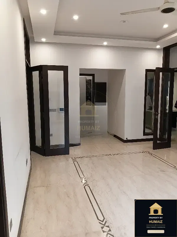500 Sq. Yd. 6-Bedroom Luxury Villa (Basement, 5 Bath, Residence 31) in DHA Phase 8 For Rent in DHA Phase 8 Karachi — Photograph 4