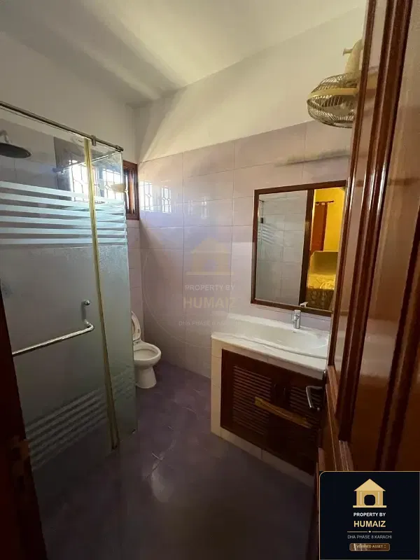 500 Sq. Yd. 6-Bedroom Luxury Villa (Basement, 6 Bath, Residence 1) in Zone A For Rent in DHA Phase 8 Karachi — Photograph 13