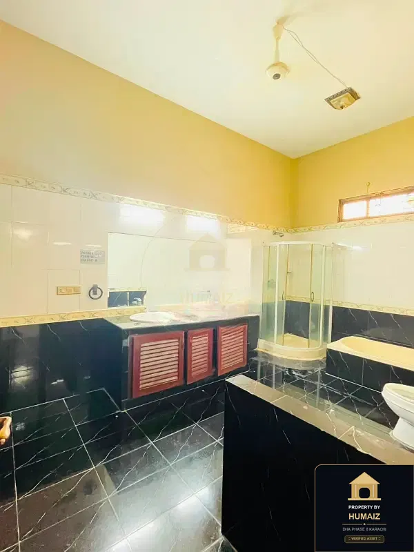 1,000 Sq. Yd. 6-Bedroom Luxury Villa (7 Bath, Residence 18) in DHA Phase 8 For Rent in DHA Phase 8 Karachi — Photograph 18