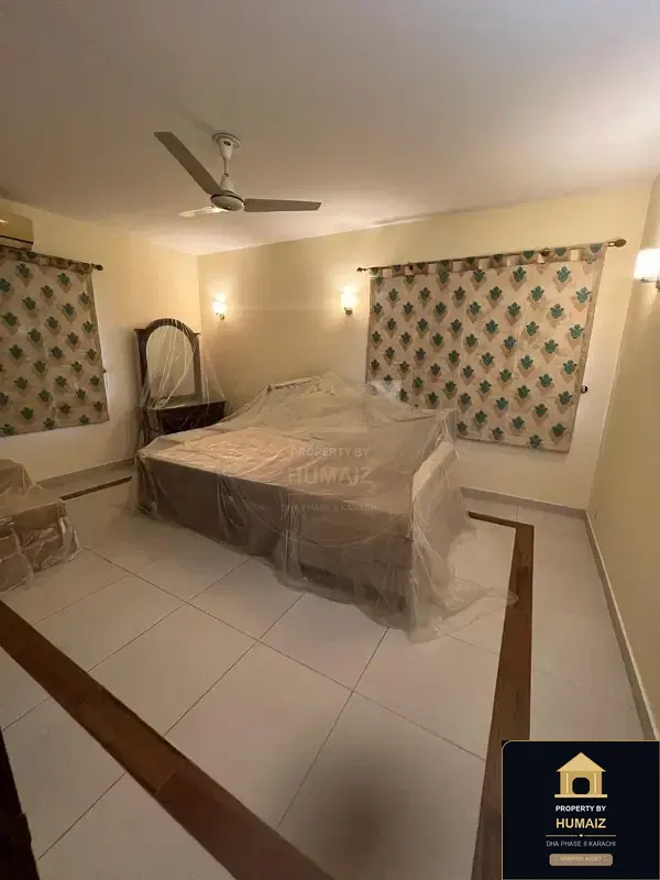 500 Sq. Yd. 6-Bedroom Luxury Villa (Basement, 6 Bath, Residence 1) in Zone A For Rent in DHA Phase 8 Karachi — Photograph 3