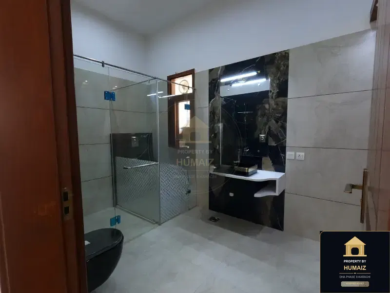 500 Sq. Yd. 5-Bedroom Luxury Villa (Private Pool, 6 Bath, Residence 1) in Zone A For Sale in DHA Phase 8 Karachi — Photograph 3