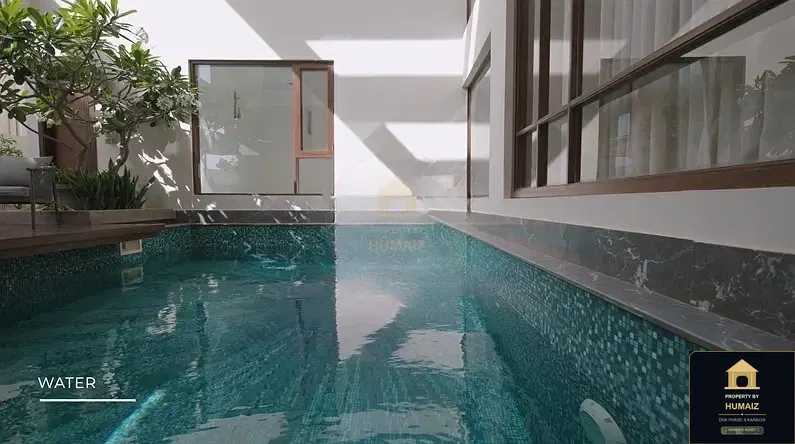 1,000 Sq. Yd. 6-Bedroom Luxury Villa (Private Pool, 6 Bath, Residence 2) in Khayaban-e-Bahria For Sale in DHA Phase 8 Karachi — Photograph 6