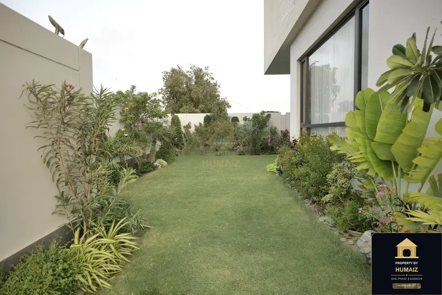 1,000 Sq. Yd. 7-Bedroom Luxury Villa in Khayaban-e-Bahria For Sale in DHA Phase 8 Karachi — Photograph 7