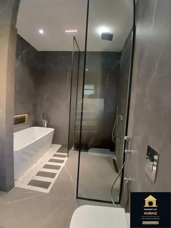 666 Sq. Yd. 5-Bedroom Luxury Villa (Basement, 6 Bath, Residence 1) in Zone A For Sale in DHA Phase 8 Karachi — Photograph 10