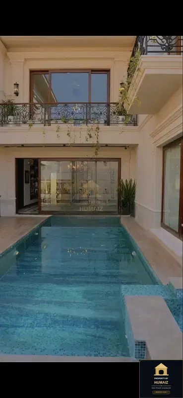 1,000 Sq. Yd. 6-Bedroom Luxury Villa (Private Pool, 6 Bath, Residence 9) in Zone A For Sale in DHA Phase 8 Karachi — Photograph 4