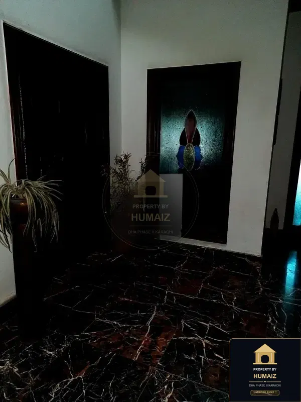 1,000 Sq. Yd. 6-Bedroom Luxury Villa (6 Bath, Residence 30) in DHA Phase 8 For Sale in DHA Phase 8 Karachi — Photograph 11