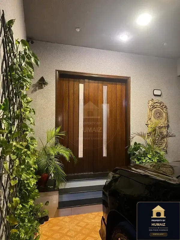 500 Sq. Yd. 6-Bedroom Luxury Villa on Khayaban-e-Tariq For Sale in DHA Phase 8 Karachi — Photograph 8