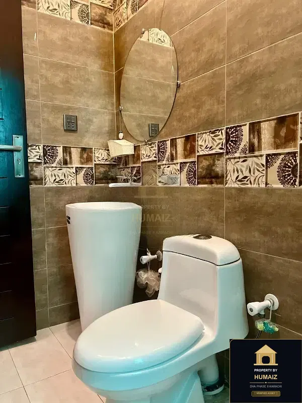 100 Sq. Yd. 4-Bedroom Luxury Villa (Basement, 4 Bath, Residence 7) in DHA Phase 8 For Rent in DHA Phase 8 Karachi — Photograph 4