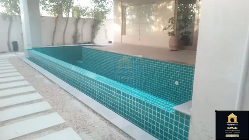 1,000 Sq. Yd. 7-Bedroom Luxury Villa (Private Pool, 7 Bath, Residence 1) in DHA Phase 8 For Rent in DHA Phase 8 Karachi — Photograph 5