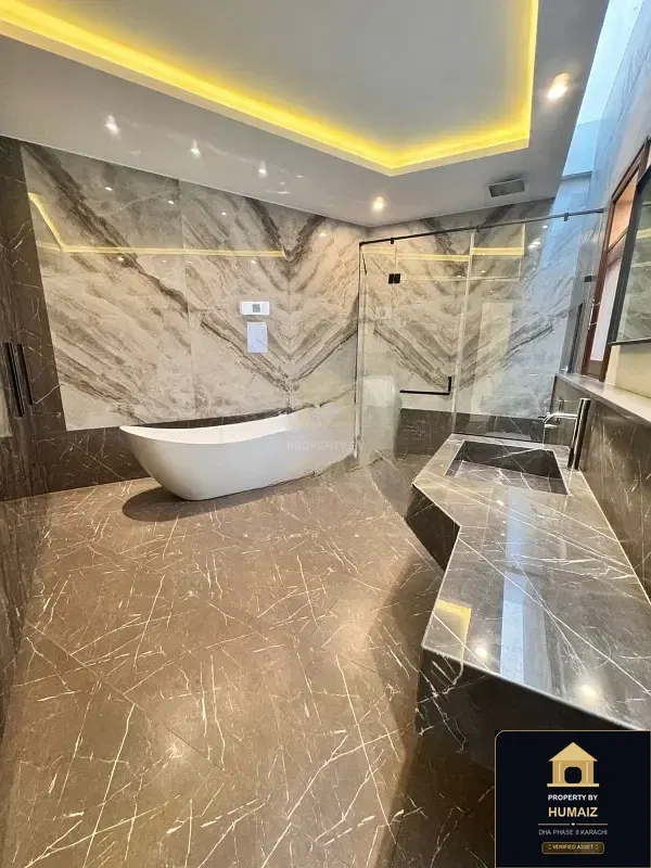 1,000 Sq. Yd. 6-Bedroom Luxury Villa (Private Pool, 6 Bath, Residence 12) in Zone A For Sale in DHA Phase 8 Karachi — Photograph 6