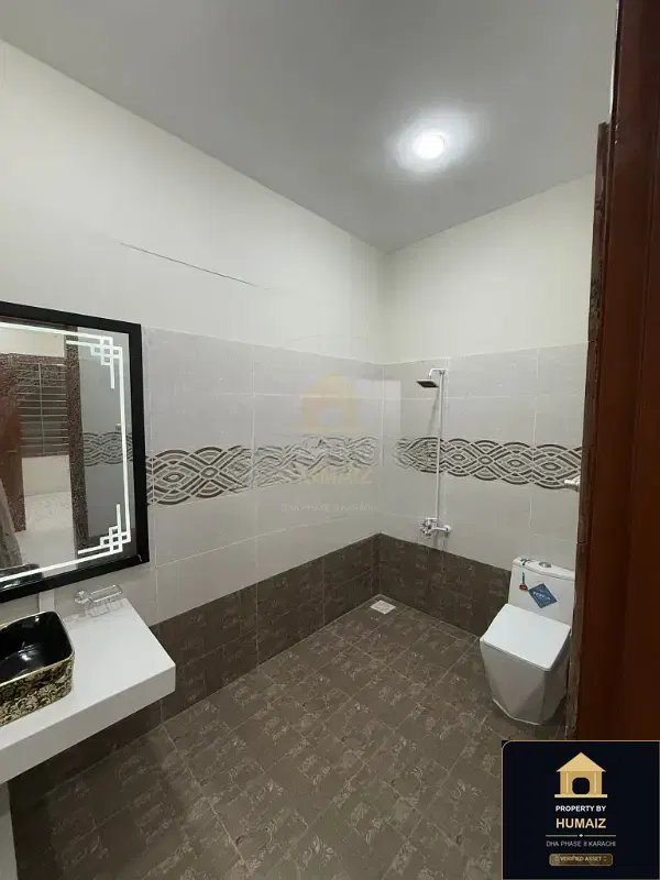 100 Sq. Yd. 4-Bedroom Luxury Villa (Basement, 5 Bath, Residence 12) in DHA Phase 8 For Sale in DHA Phase 8 Karachi — Photograph 6