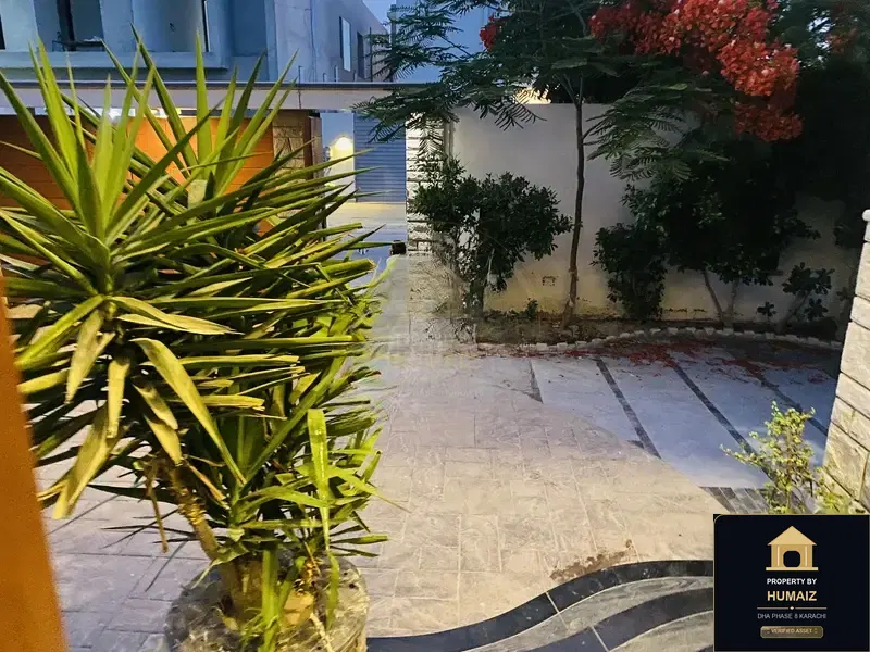 666 Sq. Yd. 6-Bedroom Luxury Villa (Basement, 7 Bath, Residence 1) in DHA Phase 8 For Rent in DHA Phase 8 Karachi — Photograph 3