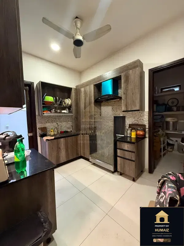 500 Sq. Yd. 4-Bedroom Luxury Villa (Basement, 5 Bath, Residence 1) in Zone B For Rent in DHA Phase 8 Karachi — Photograph 11