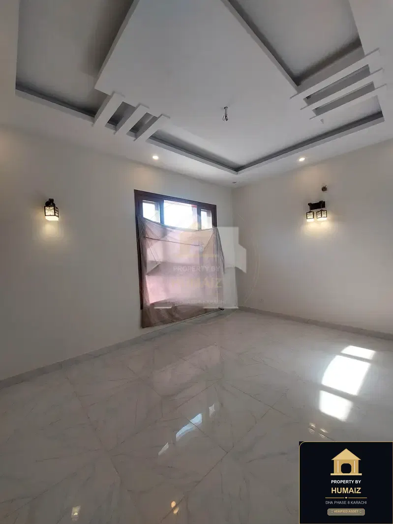 100 Sq. Yd. 4-Bedroom Luxury Villa (Basement, 5 Bath, Residence 6) in DHA Phase 8 For Sale in DHA Phase 8 Karachi — Photograph 2
