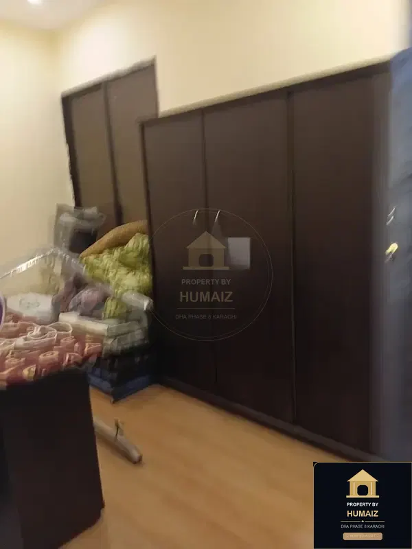 100 Sq. Yd. 3-Bedroom Luxury Villa (Basement, 3 Bath, Residence 1) in Zone B For Sale in DHA Phase 8 Karachi — Photograph 11