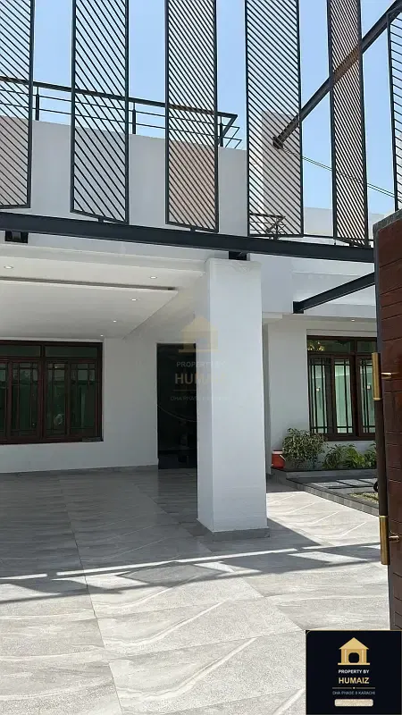 666 Sq. Yd. 6-Bedroom Luxury Villa (Boulevard Facing, 6 Bath, Residence 2) on Khayaban-e-Ittehad For Sale in DHA Phase 8 Karachi — Photograph 2