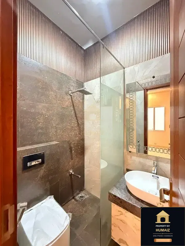 100 Sq. Yd. 4-Bedroom Luxury Villa (Basement, 4 Bath, Residence 3) in Zone B For Sale in DHA Phase 8 Karachi — Property by Humaiz Architectural Asset