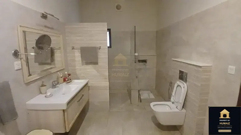 1,000 Sq. Yd. 7-Bedroom Luxury Villa (Basement, 7 Bath, Residence 4) in DHA Phase 8 For Sale in DHA Phase 8 Karachi — Photograph 8