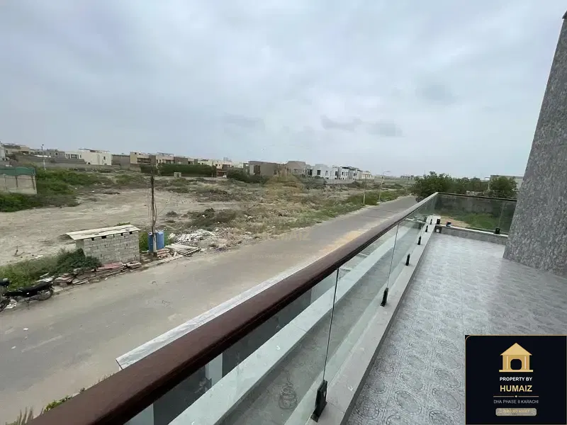 666 Sq. Yd. 6-Bedroom Luxury Villa in Khayaban-e-Bahria For Sale in DHA Phase 8 Karachi — Photograph 21