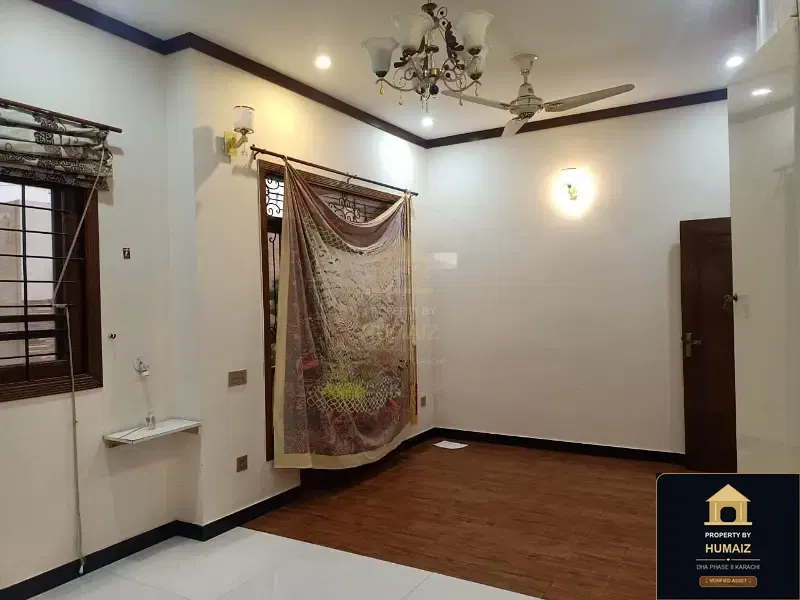100 Sq. Yd. 3-Bedroom Luxury Villa (Basement, 4 Bath, Residence 1) in DHA Phase 8 For Rent in DHA Phase 8 Karachi — Photograph 2