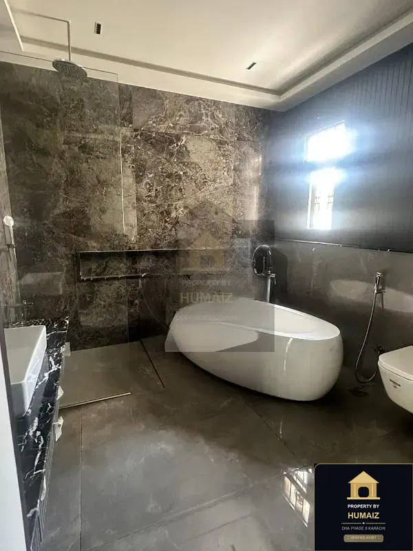 1,000 Sq. Yd. 6-Bedroom Luxury Villa (Private Pool, 6 Bath, Residence 8) in Zone A For Sale in DHA Phase 8 Karachi — Photograph 8