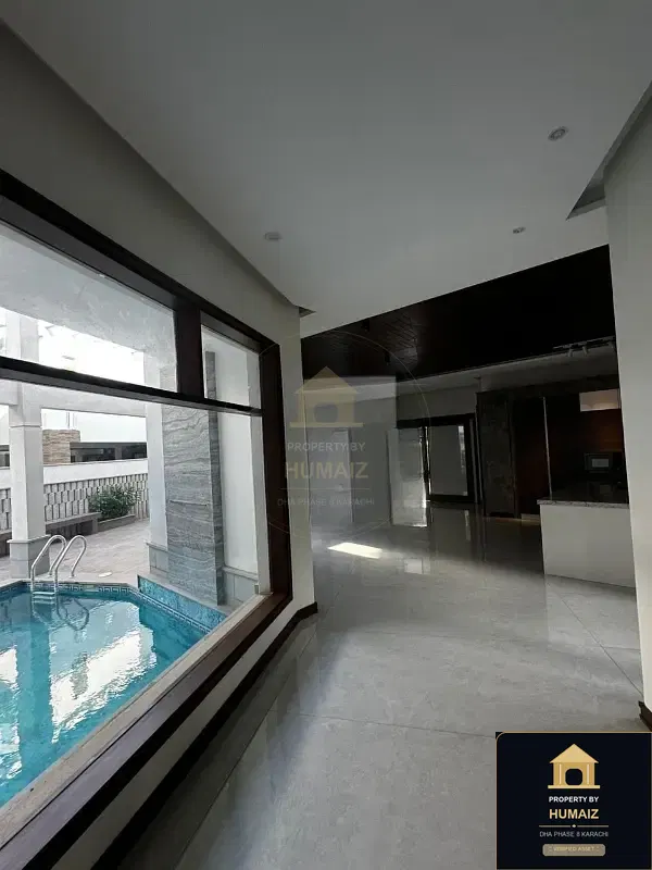 1,000 Sq. Yd. 6-Bedroom Luxury Villa (Private Pool, 7 Bath, Residence 33) in DHA Phase 8 For Sale in DHA Phase 8 Karachi — Photograph 6