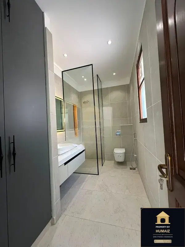 1,000 Sq. Yd. 6-Bedroom Luxury Villa (Basement, 6 Bath, Residence 60) in DHA Phase 8 For Sale in DHA Phase 8 Karachi — Photograph 25