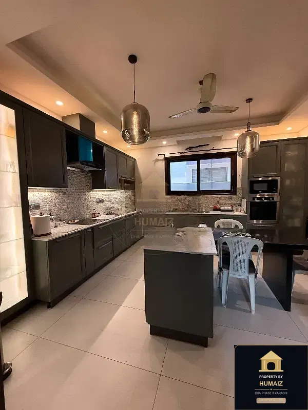 500 Sq. Yd. 5-Bedroom Luxury Villa (Basement, 6 Bath, Residence 12) in DHA Phase 8 For Rent in DHA Phase 8 Karachi — Photograph 2