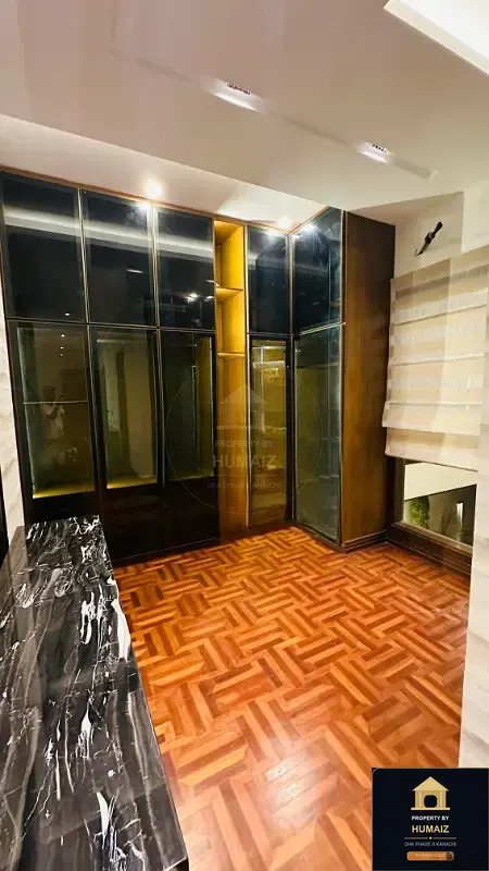 1,000 Sq. Yd. 6-Bedroom Luxury Villa (Basement, 7 Bath, Residence 5) in Zone A For Sale in DHA Phase 8 Karachi — Photograph 18