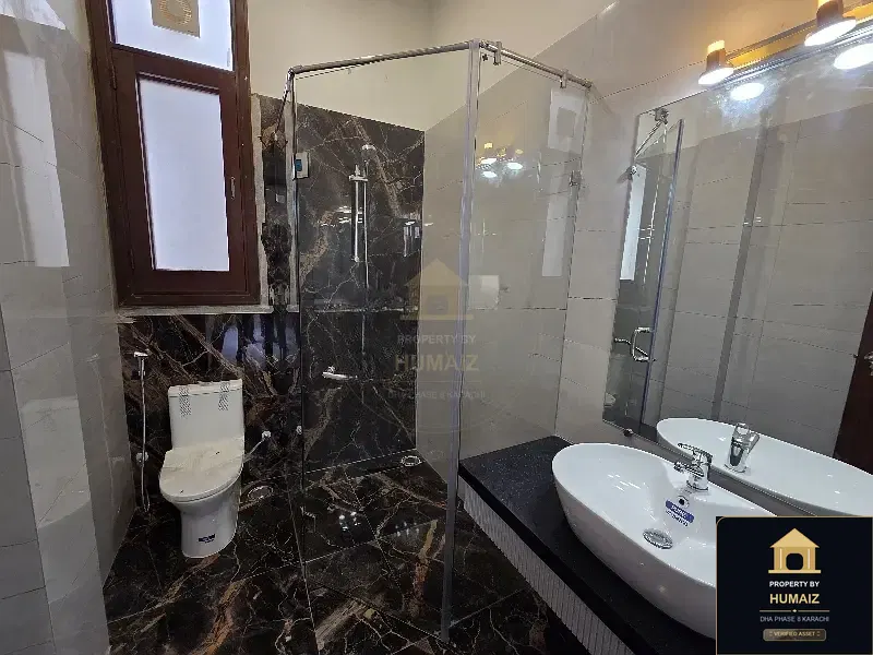 100 Sq. Yd. 4-Bedroom Luxury Villa (Basement, 4 Bath, Residence 22) in DHA Phase 8 For Sale in DHA Phase 8 Karachi — Photograph 9