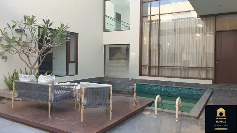 1,000 Sq. Yd. 6-Bedroom Luxury Villa (Basement, 6 Bath, Residence 2) in Zone A For Sale in DHA Phase 8 Karachi — Photograph 3