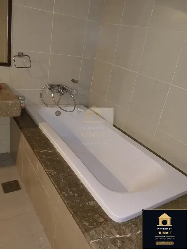 4-Bedroom Luxury Apartment (5 Bath, Suite 5) at Coral Towers For Rent in DHA Phase 8 Karachi — Photograph 4
